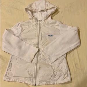 White sports jacket + blue striped tennis skirt